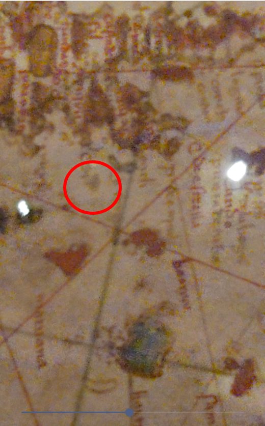 Detail of the De la Cosa map showing an elongated pigment fade that could be misread as a channel