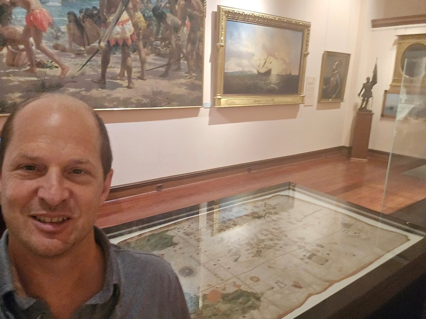 Graham Balch at the Museo Naval in Madrid, standing near the 1500 Juan de la Cosa map